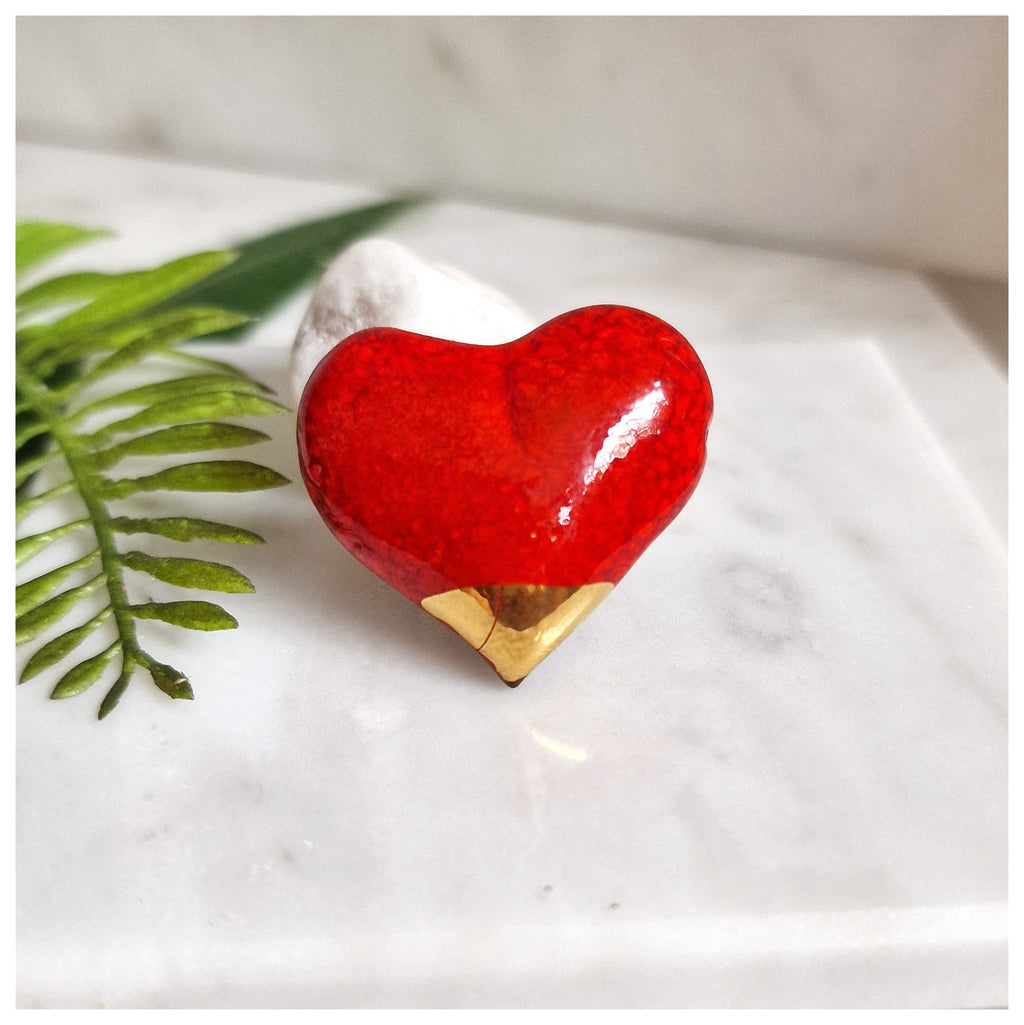 Anillo corazón dorado