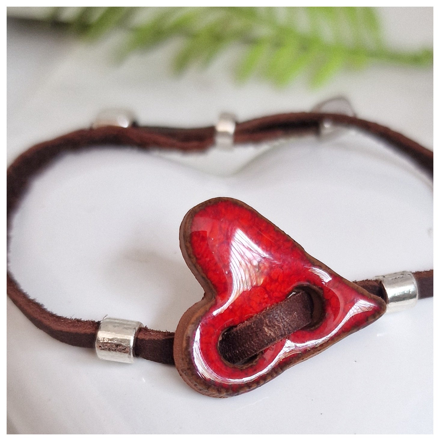 Pulsera corazón plata y cuero