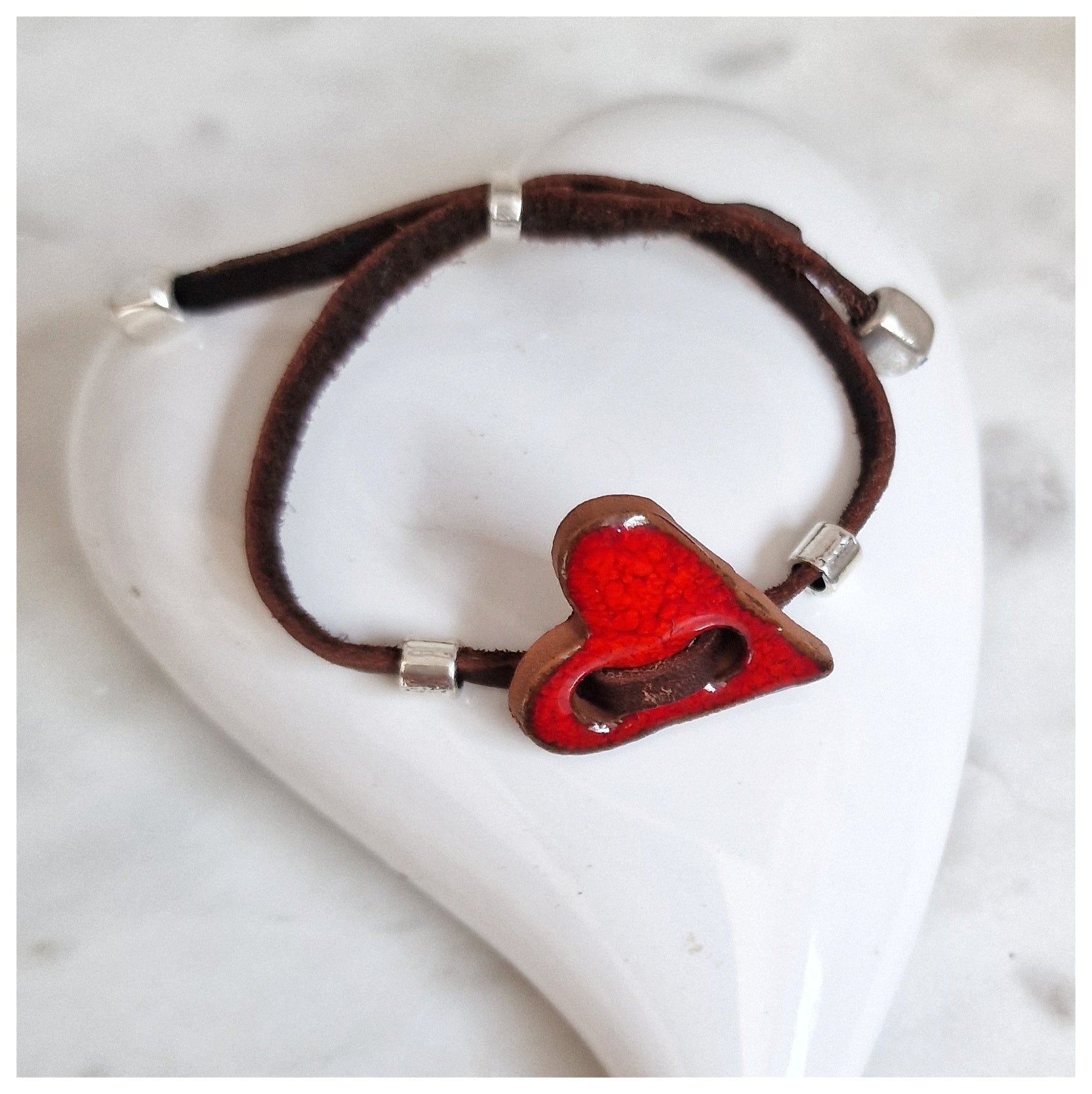 Pulsera corazón plata y cuero