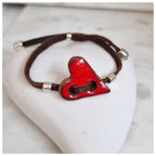 Pulsera corazón plata y cuero