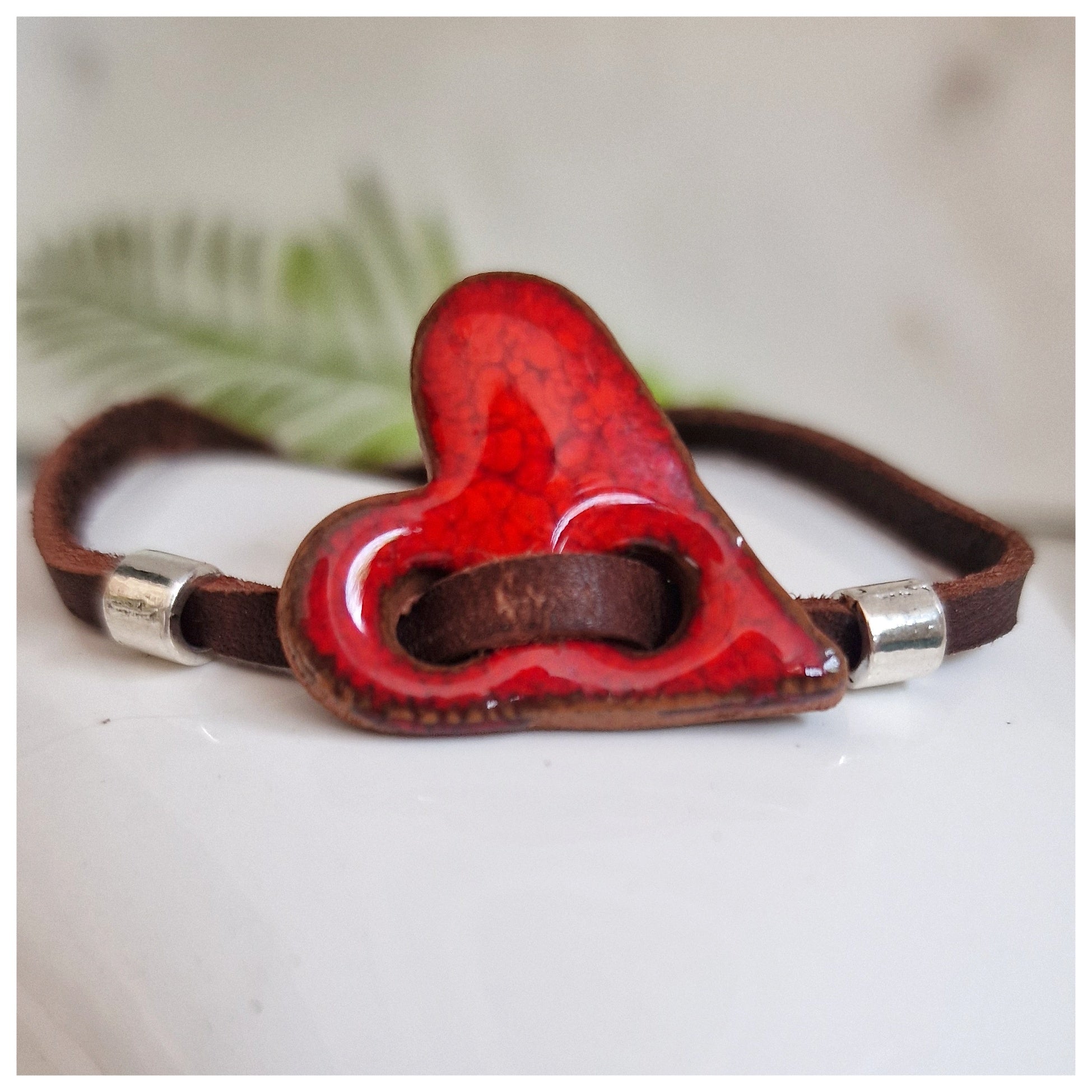 Pulsera corazón plata y cuero